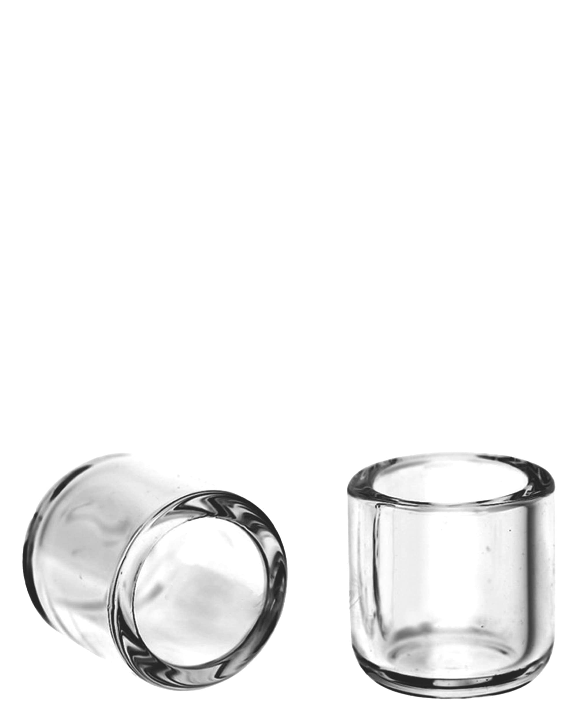 A close-up, angled view of the Honey Insert Cups, showcasing their clear glass construction and simple, cylindrical shape. A close-up, angled view of the Honey Insert Cups, showcasing their clear glass construction and simple, cylindrical shape.