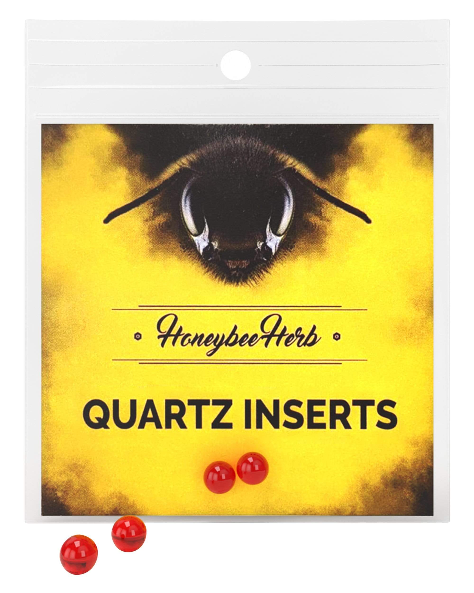 A close-up of Honey Pearls, showing three small, round, reddish-brown objects arranged against a yellow background. A close-up of Honey Pearls, showing three small, round, reddish-brown objects arranged against a yellow background.