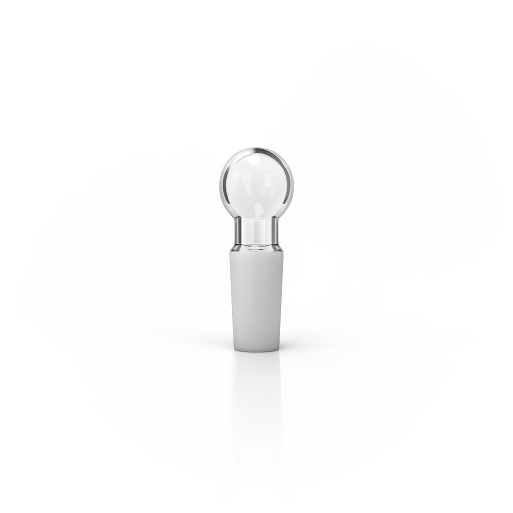 Front view of the Glass ISO Station Replacement Plug, a small, clear cylindrical piece isolated on a white background. Front view of the Glass ISO Station Replacement Plug, a small, clear cylindrical piece isolated on a white background.