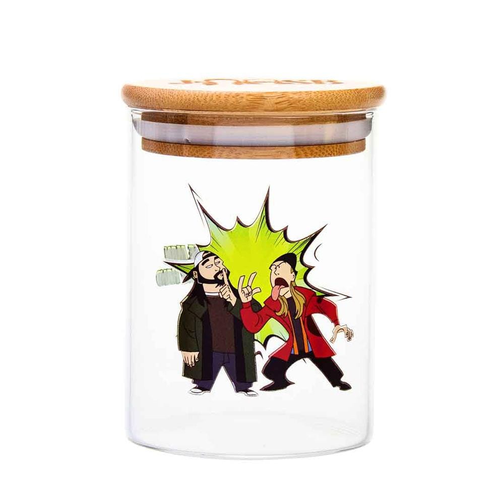 Front view of the 15 Bucks Stash Jar, a clear glass jar with a cartoon graphic of two figures in action. Front view of the 15 Bucks Stash Jar, a clear glass jar with a cartoon graphic of two figures in action.