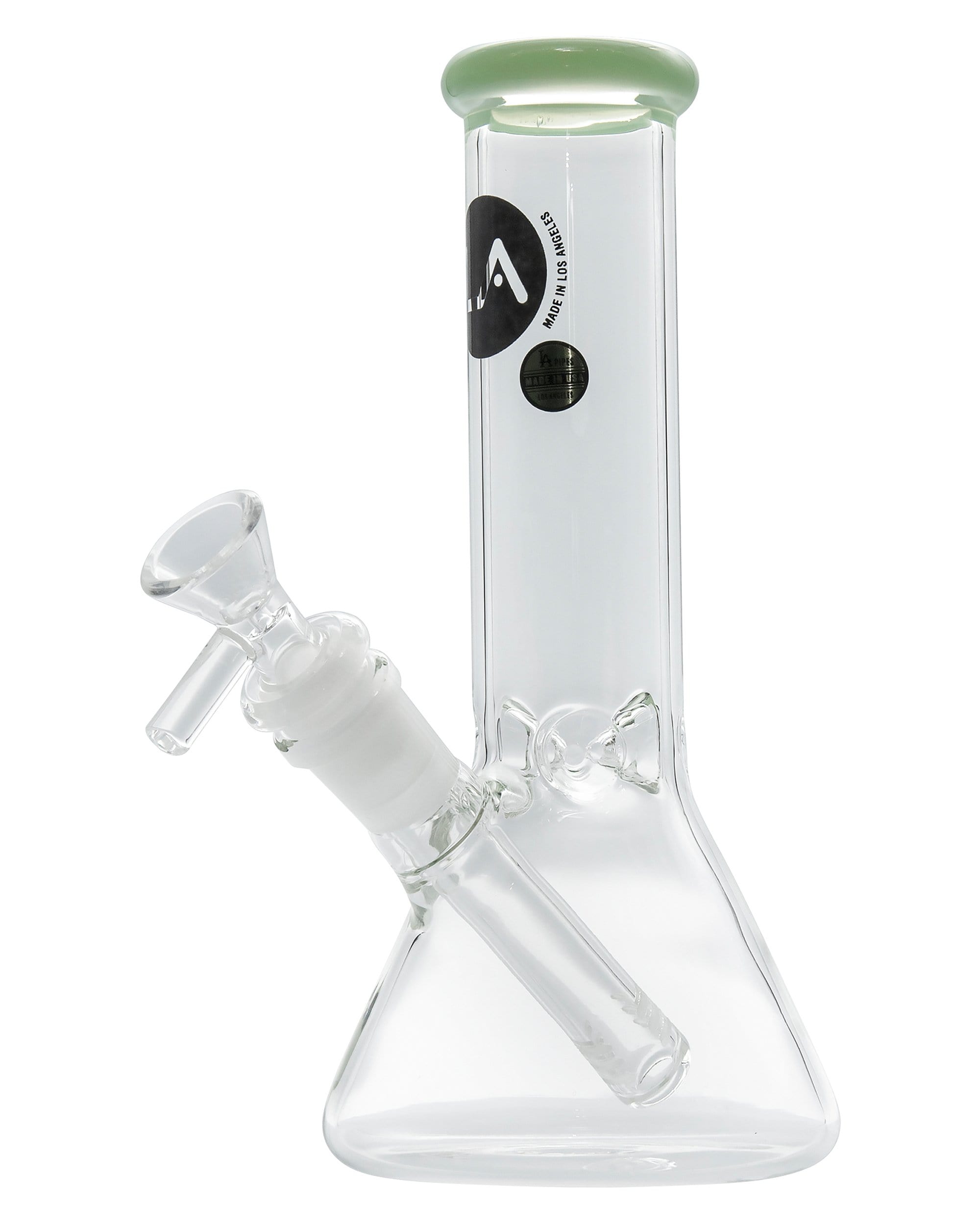 A studio shot presents the Color Accented Mini Beaker Bong, displaying its clear glass construction and simple, cylindrical form. A studio shot presents the Color Accented Mini Beaker Bong, displaying its clear glass construction and simple, cylindrical form.