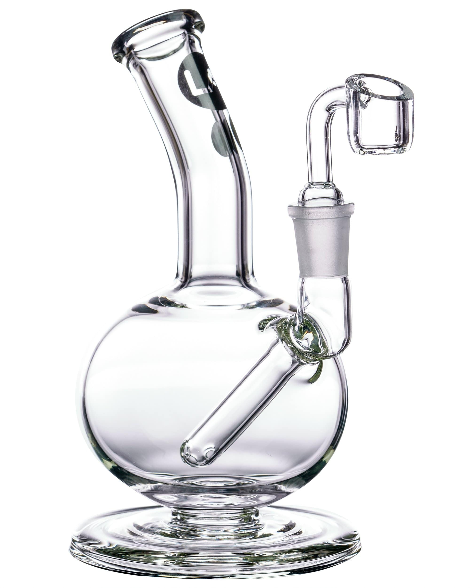 Front view of the Heavy Mini Pedestal Dab Rig, showcasing its clear glass construction and small, pedestal base. Front view of the Heavy Mini Pedestal Dab Rig, showcasing its clear glass construction and small, pedestal base.