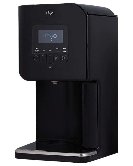 A front view of the LEVO II Oil Infuser, a sleek, black appliance with a digital display, sits on a dark surface. A front view of the LEVO II Oil Infuser, a sleek, black appliance with a digital display, sits on a dark surface.