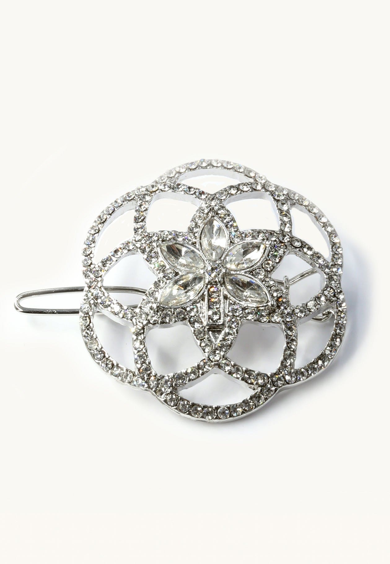 A close-up shot of the Flower of Life Barrette, showcasing its intricate, floral design against a plain white background. A close-up shot of the Flower of Life Barrette, showcasing its intricate, floral design against a plain white background.