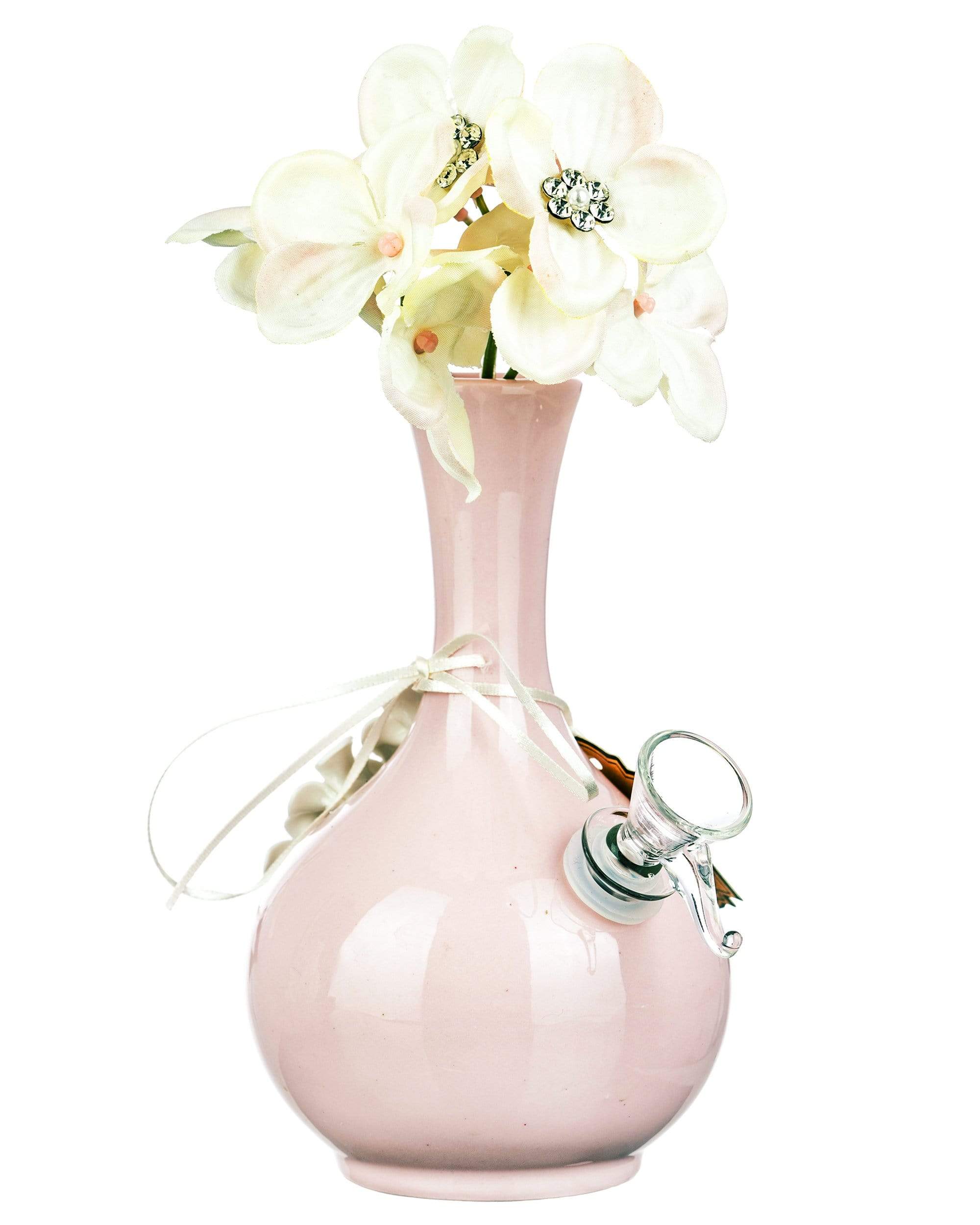 A front view of the “Rachel” Water Pipe, featuring a light pink glass body with a delicate floral arrangement nearby. A front view of the “Rachel” Water Pipe, featuring a light pink glass body with a delicate floral arrangement nearby.
