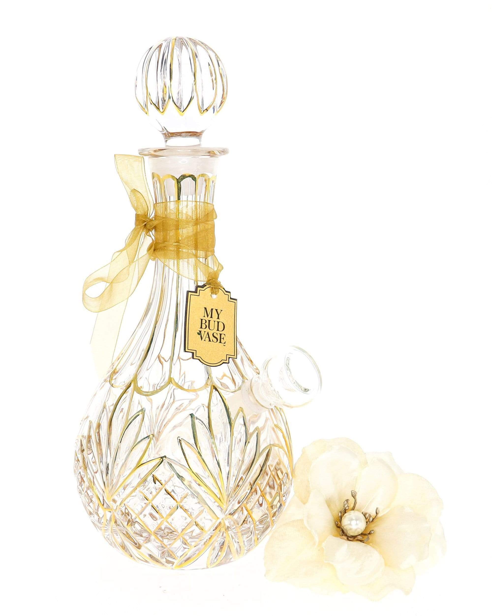 A slightly angled view of the “Stardust” Water Pipe, a clear glass piece with a unique, rounded base and delicate curves. A slightly angled view of the “Stardust” Water Pipe, a clear glass piece with a unique, rounded base and delicate curves.