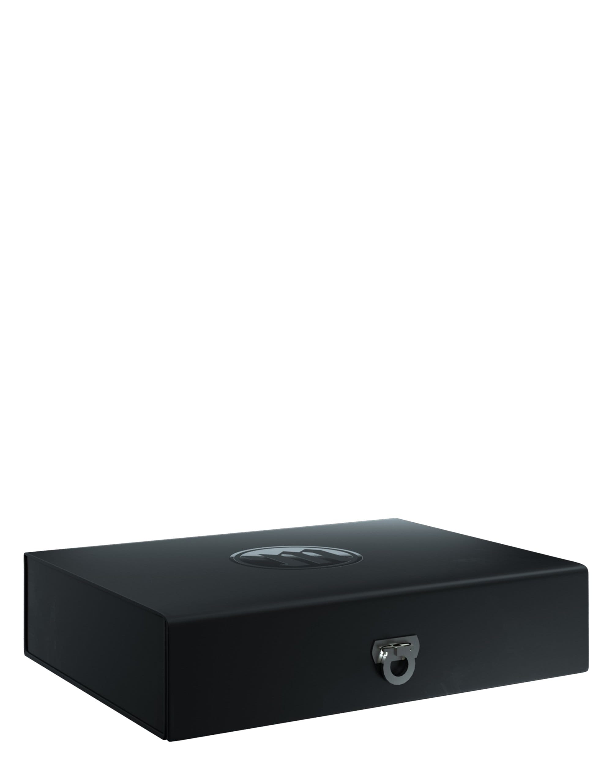 The StashBox appears as a sleek, black rectangular container captured in a top-down studio shot. The StashBox appears as a sleek, black rectangular container captured in a top-down studio shot.