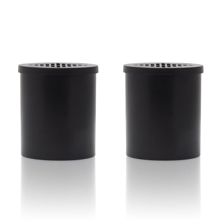 A studio shot displays the two Air Filter Replacement Cartridges, positioned side-by-side on a reflective surface. A studio shot displays the two Air Filter Replacement Cartridges, positioned side-by-side on a reflective surface.