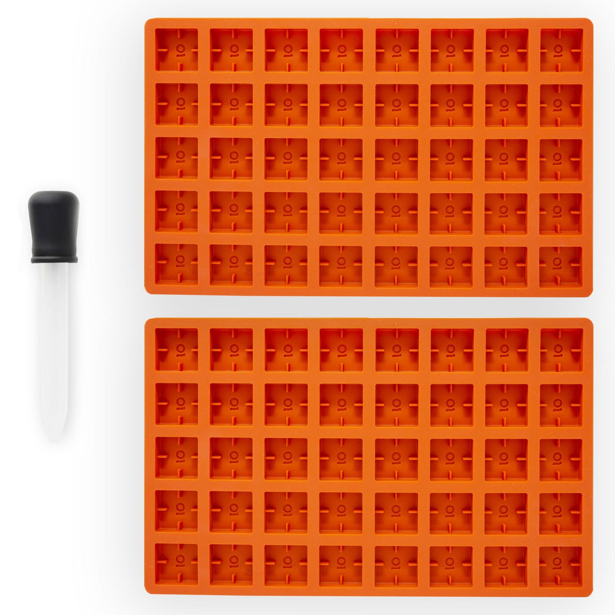 A top-down view of the Scored Gummy Molds, displaying multiple rectangular silicone molds arranged neatly on a white surface. A top-down view of the Scored Gummy Molds, displaying multiple rectangular silicone molds arranged neatly on a white surface.
