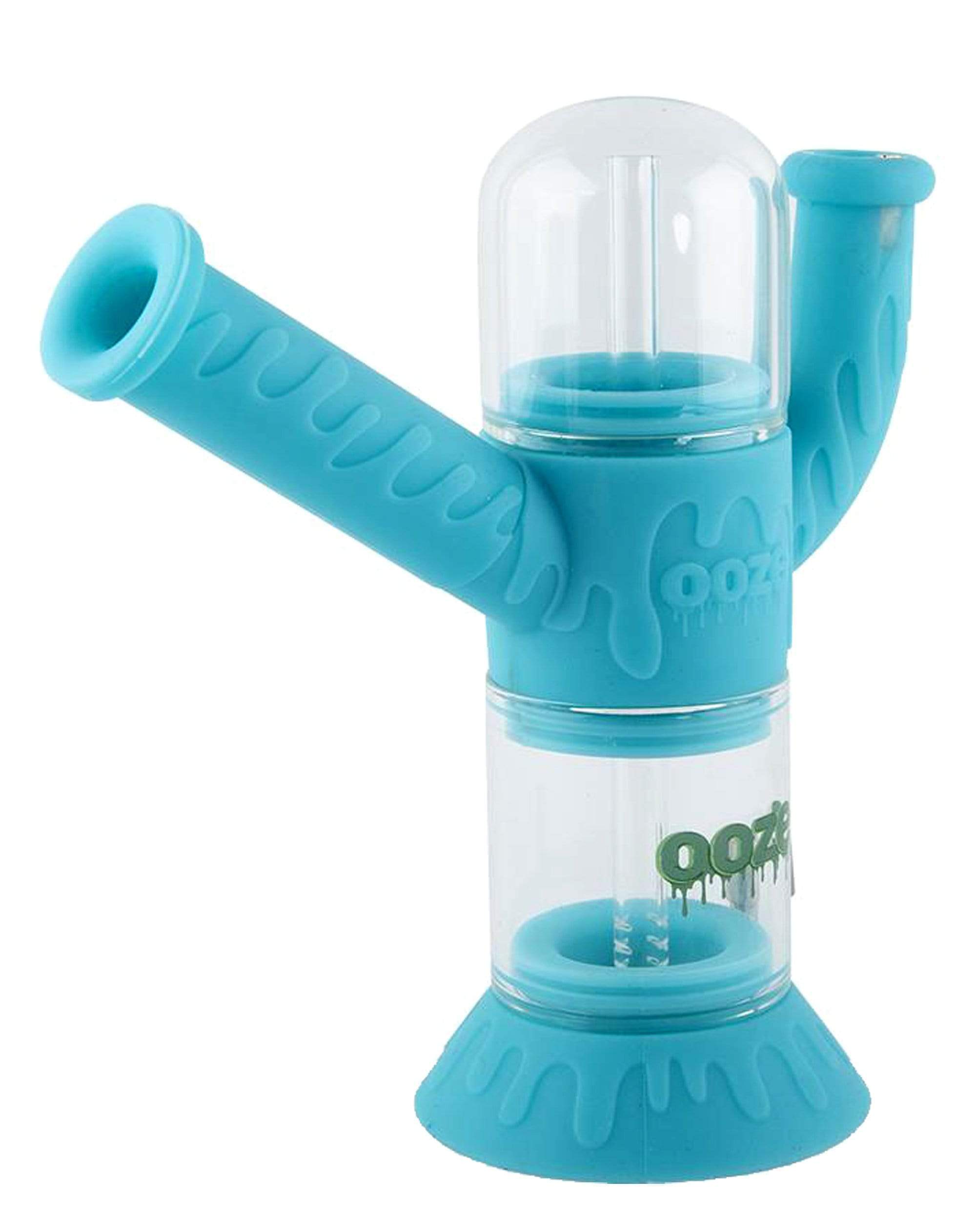 Front view of the Cranium Silicone 4-in-1 Hybrid Water Pipe, showcasing its clear, textured design with a curved mouthpiece. Front view of the Cranium Silicone 4-in-1 Hybrid Water Pipe, showcasing its clear, textured design with a curved mouthpiece.
