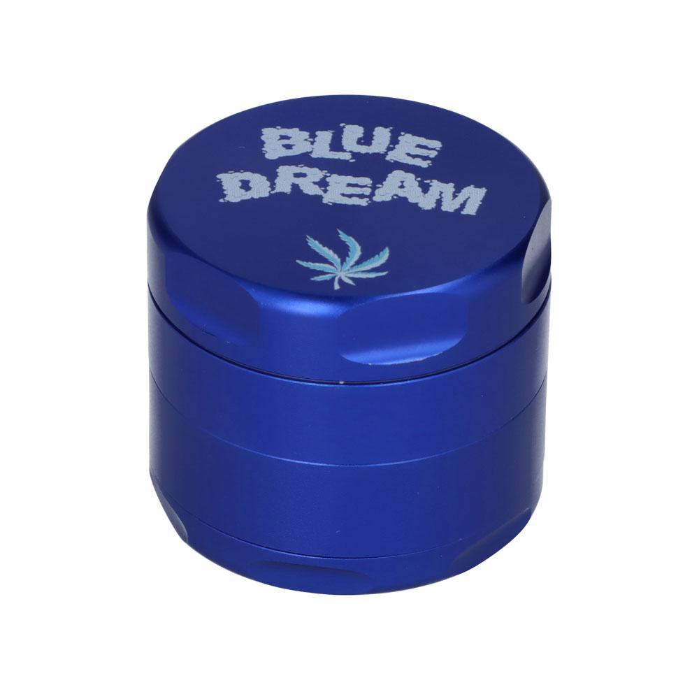 A close-up, angled view of the Blue Dream 55mm 3 Stage Grinder, showcasing its metallic finish. A close-up, angled view of the Blue Dream 55mm 3 Stage Grinder, showcasing its metallic finish.
