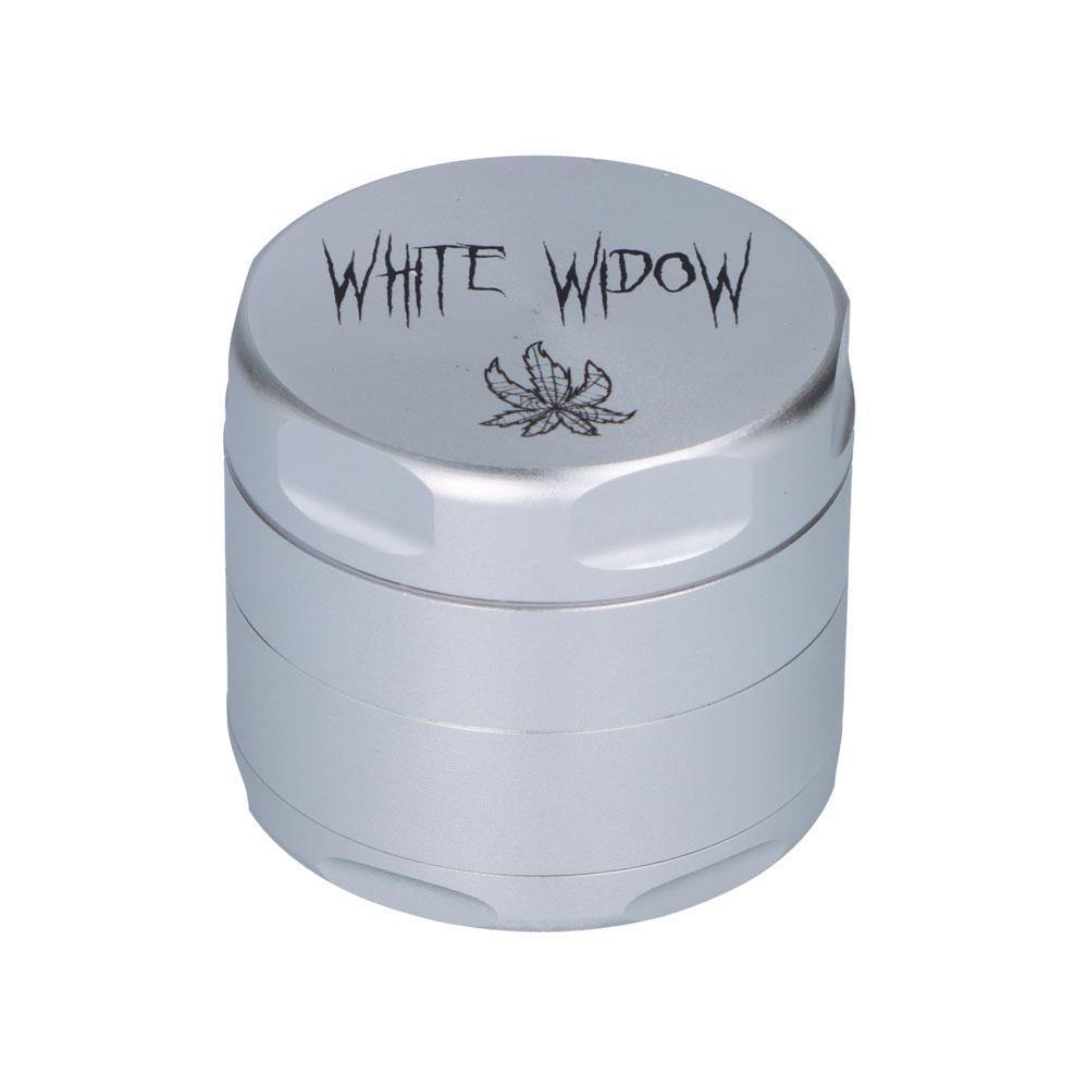 Close-up view of the White Widow 55mm 3-Stage Grinder, a metallic, cylindrical grinder with multiple tiers. Close-up view of the White Widow 55mm 3-Stage Grinder, a metallic, cylindrical grinder with multiple tiers.