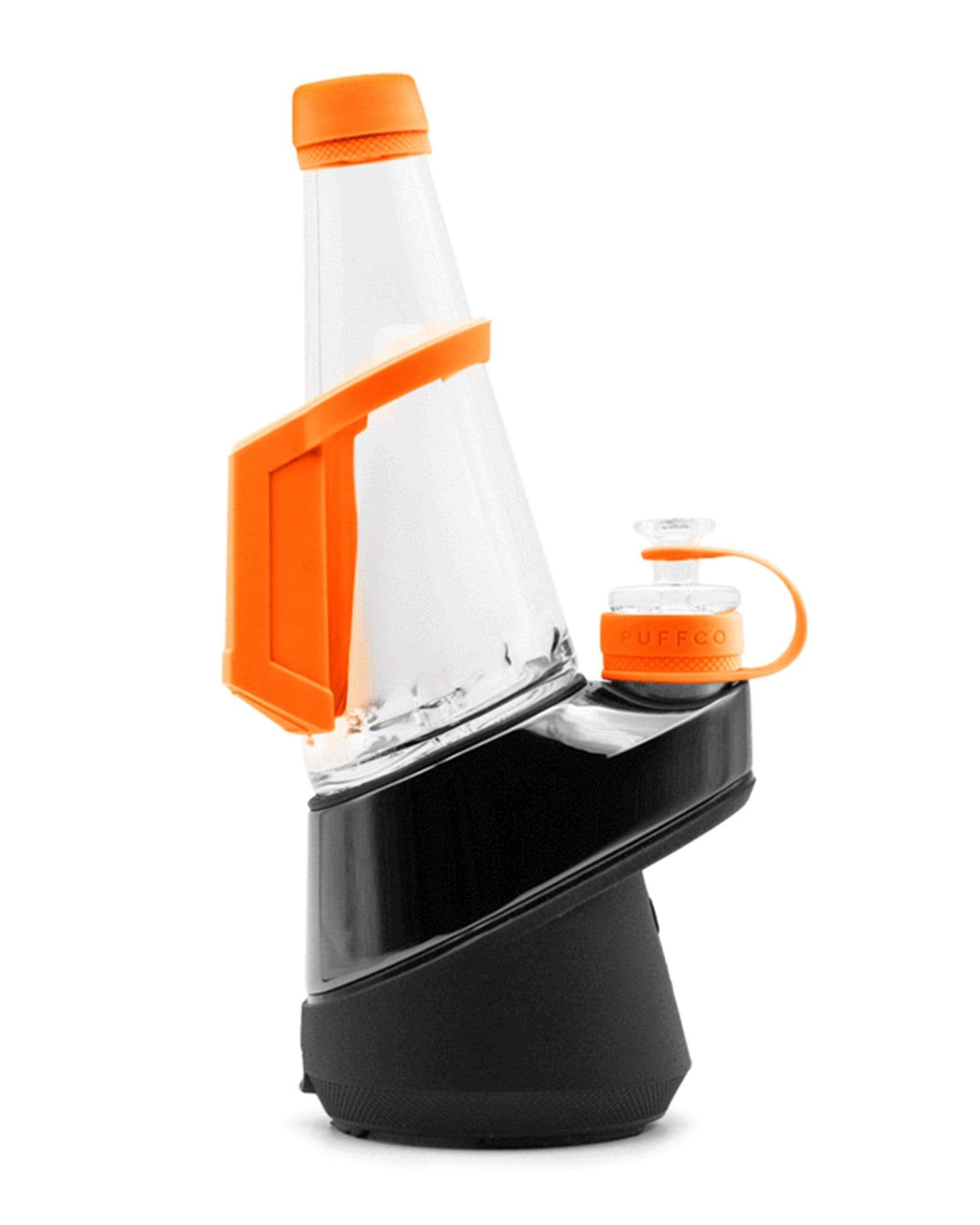 Front view of the Puffco Peak Travel Pack, showing its compact design and clear glass chamber against a plain white background. Front view of the Puffco Peak Travel Pack, showing its compact design and clear glass chamber against a plain white background.