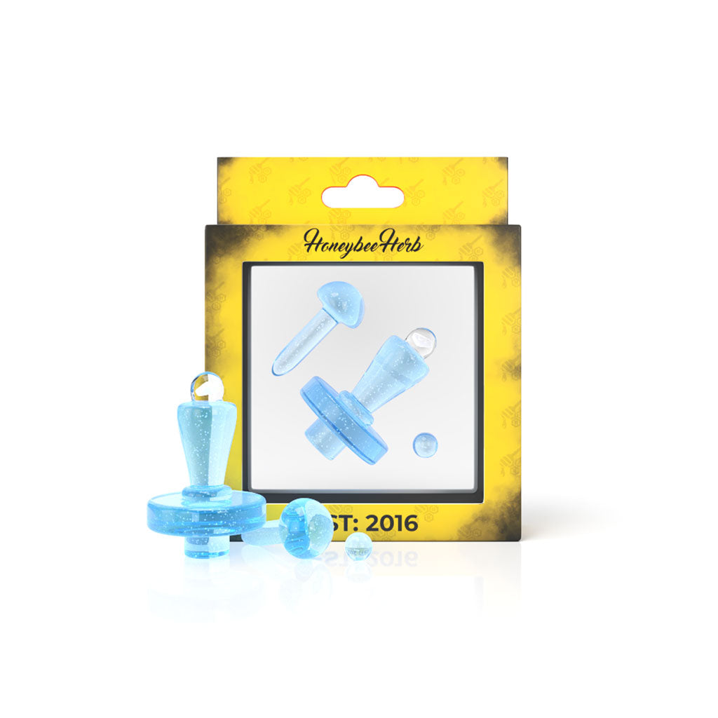 A close-up shows the Opal UV Control Tower Set, with a shimmering, iridescent surface and a unique, tower-like design. A close-up shows the Opal UV Control Tower Set, with a shimmering, iridescent surface and a unique, tower-like design.