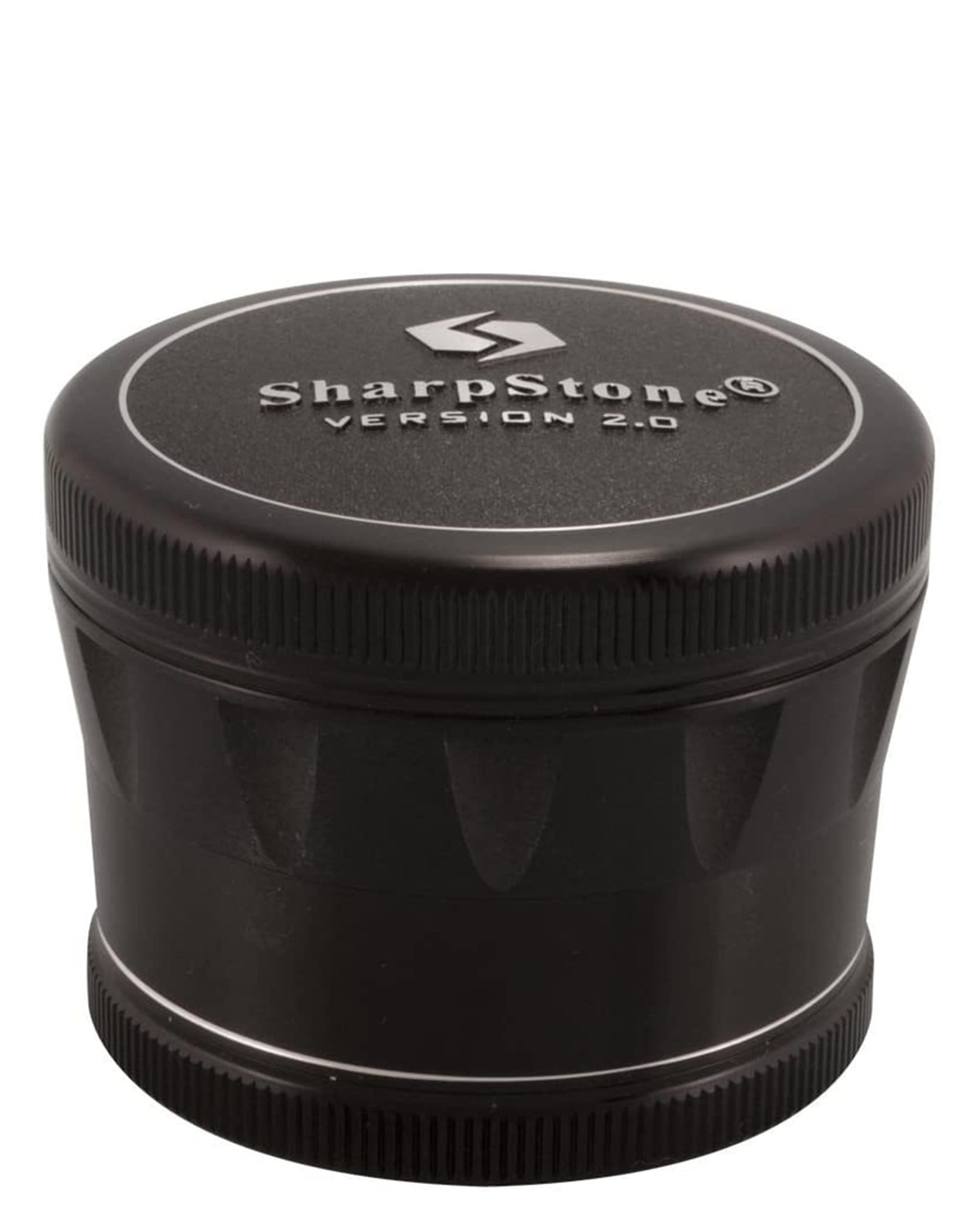 A close-up, angled view of the V2.0 Hard Top Grinder with a metallic silver finish, showcasing its cylindrical shape. A close-up, angled view of the V2.0 Hard Top Grinder with a metallic silver finish, showcasing its cylindrical shape.