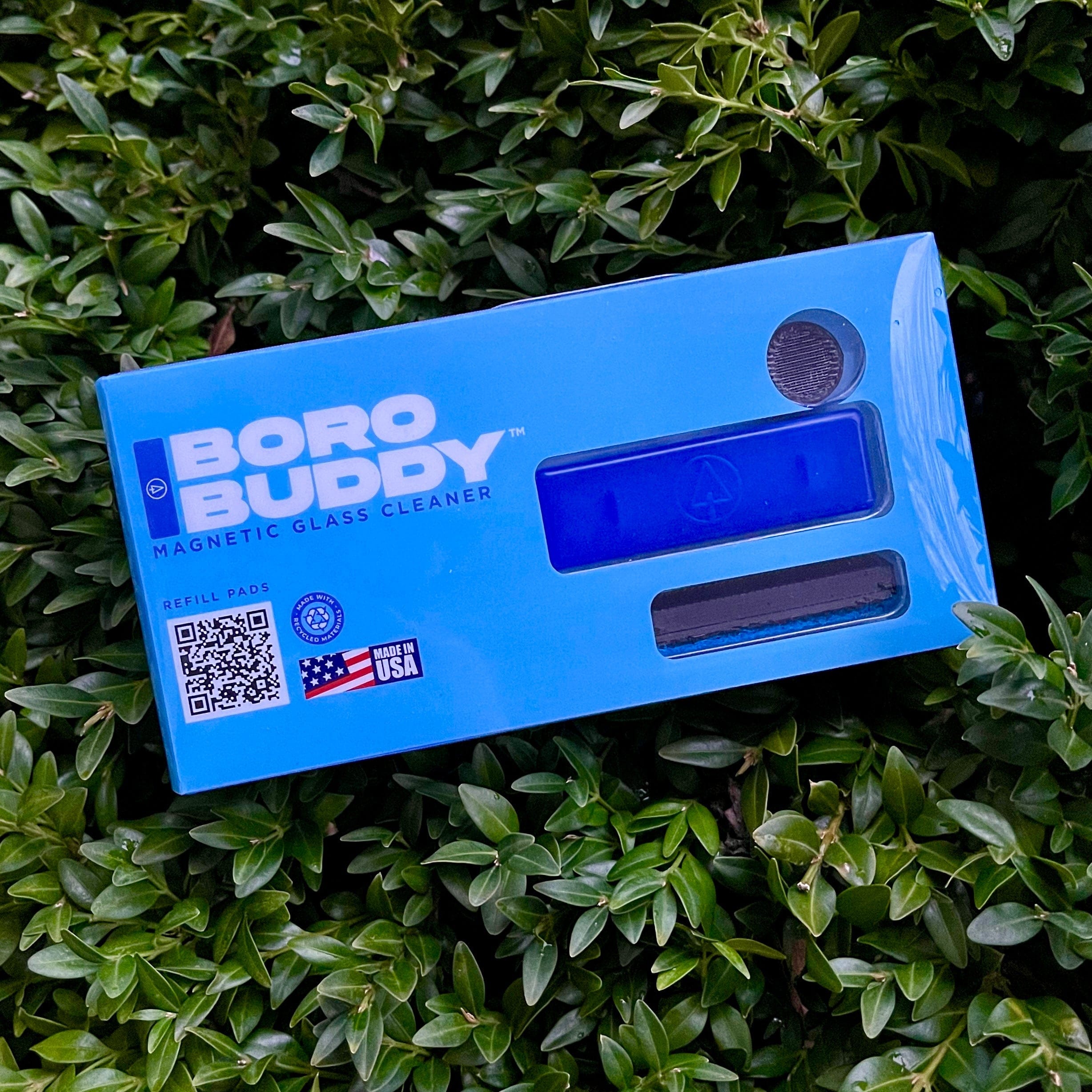 Front view of the BoroBuddy Magnetic Cleaner against a blurred green background, showcasing its rectangular shape. Front view of the BoroBuddy Magnetic Cleaner against a blurred green background, showcasing its rectangular shape.