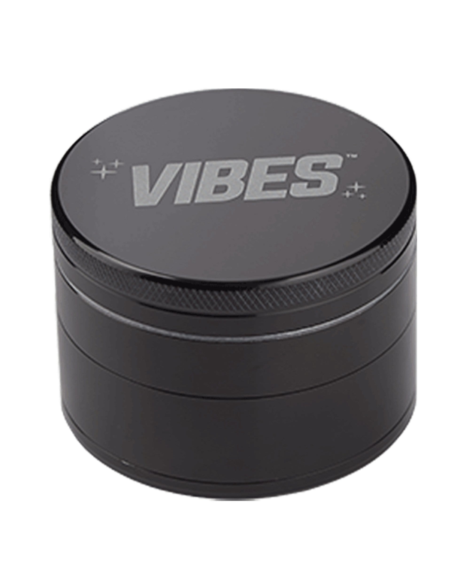 A close-up, top-down view of the Vibes 4-Piece Grinder, showing its circular, multi-tiered metallic design. A close-up, top-down view of the Vibes 4-Piece Grinder, showing its circular, multi-tiered metallic design.