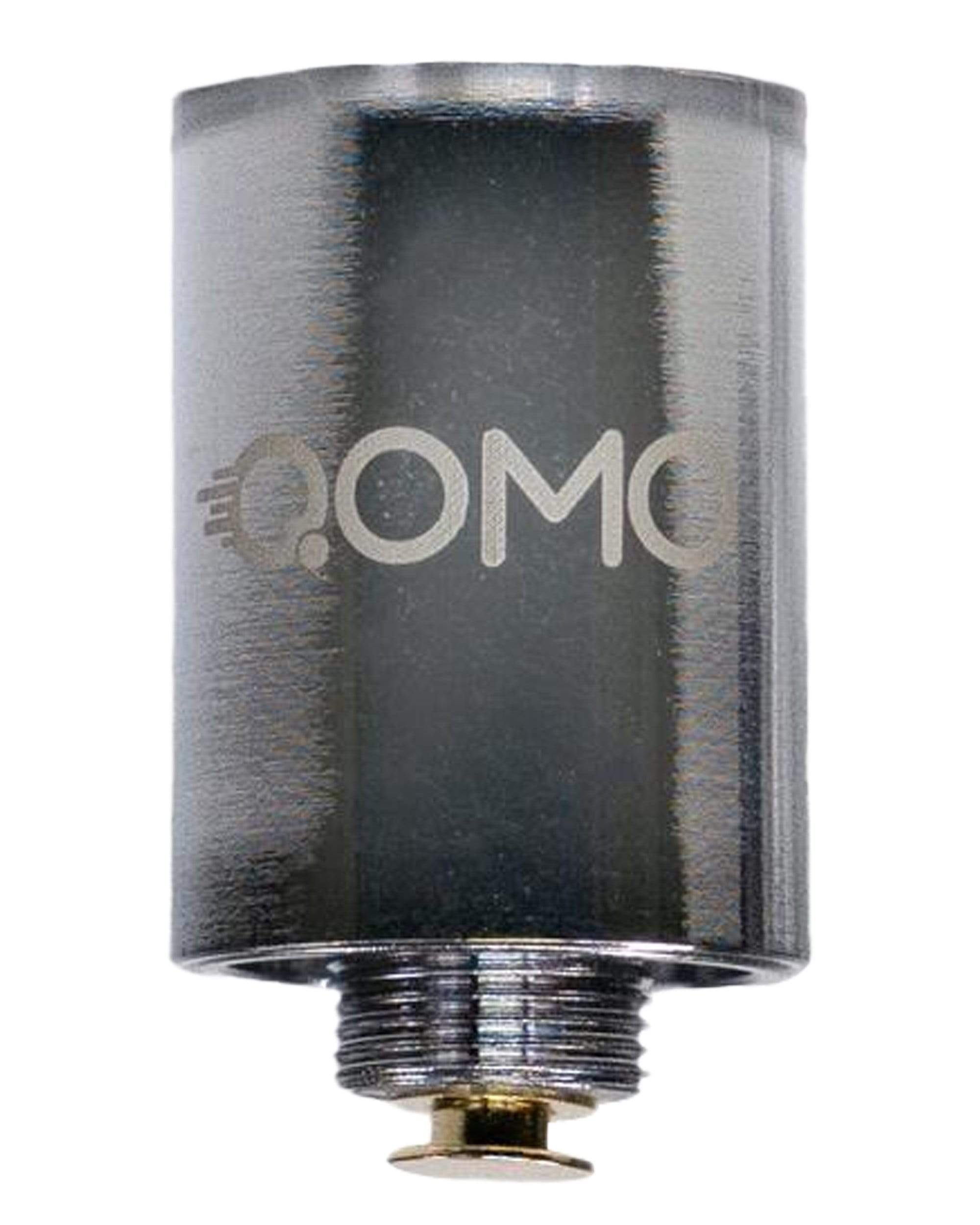 Close-up, angled view of the Qomo Atomizer, showing its metallic silver body and threaded connection detail. Close-up, angled view of the Qomo Atomizer, showing its metallic silver body and threaded connection detail.
