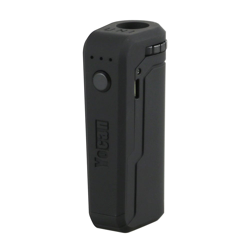 A close-up, angled view of the UNI Portable Box Mod, showcasing its sleek, dark finish and compact design. A close-up, angled view of the UNI Portable Box Mod, showcasing its sleek, dark finish and compact design.