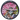 Top-down close-up of a colorful skull illustration on the DankStop Black Skull Mini Travel Grinder lid, showing a sombrero-wearing skeleton and radiating pink background.