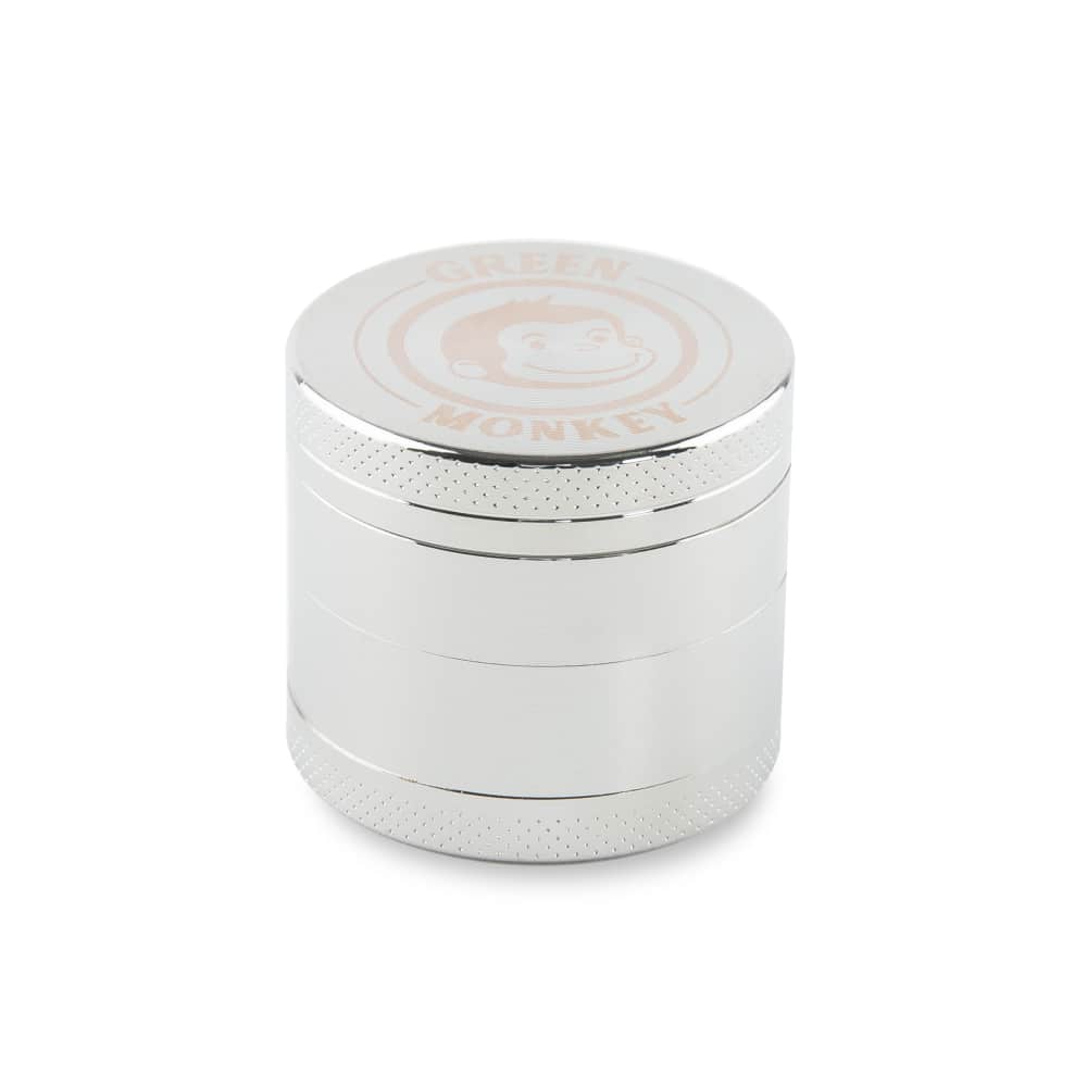 A close-up, angled view of the Capuchin 40mm Grinder, showcasing its metallic finish and cylindrical shape.