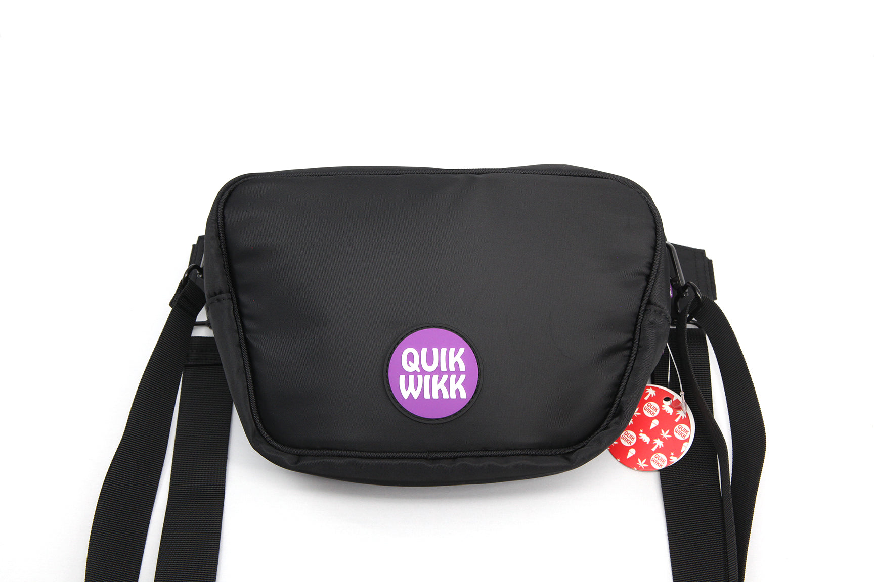 Front view of the Quik Fanny Pack with black straps, hanging against a plain white background.