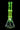 Center-lit front view of the DankStop Twisted Neon Beaker with Tree Perc showing its neon green twisted neck, vertical tree percolator, and clear beaker base against a black background