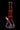 Front view of the DankStop Twisted Neon Beaker with Tree Perc in translucent red glass against a black background.