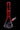 Angled front view of the DankStop Twisted Neon Beaker with Tree Perc featuring a red-tinted twisted neck and clear beaker base against a black background