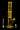 Studio-lit front view of the amber glass DankStop Twisted Straight Tube with Tree Perc against a black background.