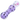 Angled close-up of the DankStop Frit Cone One Hitter - 3 in. showing a clear glass body with clustered lilac frit and scattered black accents.