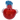 Close-up low-angle view of the DankStop Tri-Color Frit Flat Spoon Pipe - 3.5 in. showing a speckled red bowl, blue neck, and white accents