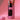 A close-up, angled view shows a joint nestled inside the Stage 1 Joint Case, against a solid pink backdrop.