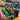 A top-down view of the Stage 2 Joint Case holding several smoking accessories against a blurred background.