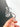 A close-up view of the Full Weld 3mm x 25mm Quartz Banger held against a dark background, highlighting its clear, cylindrical shape.