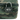 Close-up of a small camo fabric case with a silver-shackle RYOT Safe Case combination lock attached to the zipper.