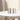 Row of five vertical metal tubes photographed front-on on a white table, showing the ONGROK USA Taster Bat - Aluminum One-Hitter in gray, black, pink, green, and gold.