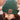 A close-up, front view of the Pot Head Beanie worn by a person, with soft lighting and a blurred background.