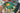 A close-up shows the Lemon Pipe held in a hand, its vibrant green color contrasting with a blurred background.