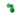 A top-down view of the Cute Animal Silicone Container, showcasing its rounded green form against a plain white background.