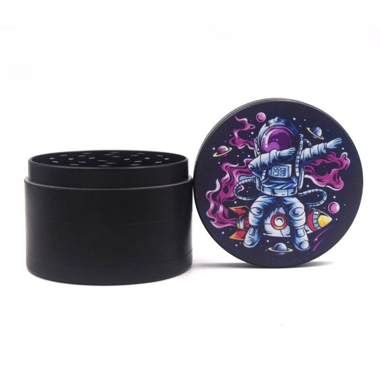 Front view of the Cloud 8 Trip To The Moon 4-Piece Grinder, featuring a celestial design on its metallic body.