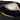 An open view of The Stowaway Smell Proof Toiletry Kit, showing its interior with organized compartments and a black fabric lining.