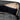 Open view of The Stowaway - Smell Proof Toiletry Kit, revealing a dark interior with a contrasting zipper closure.