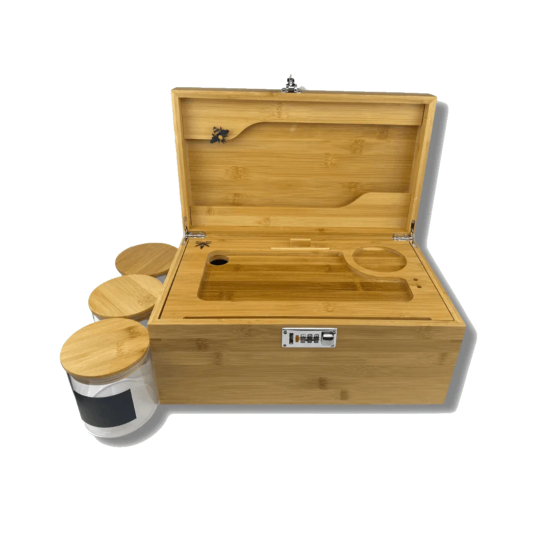 The open Bamboo Bzz Box displays three small containers inside, photographed from a slight top angle against a clean white background.