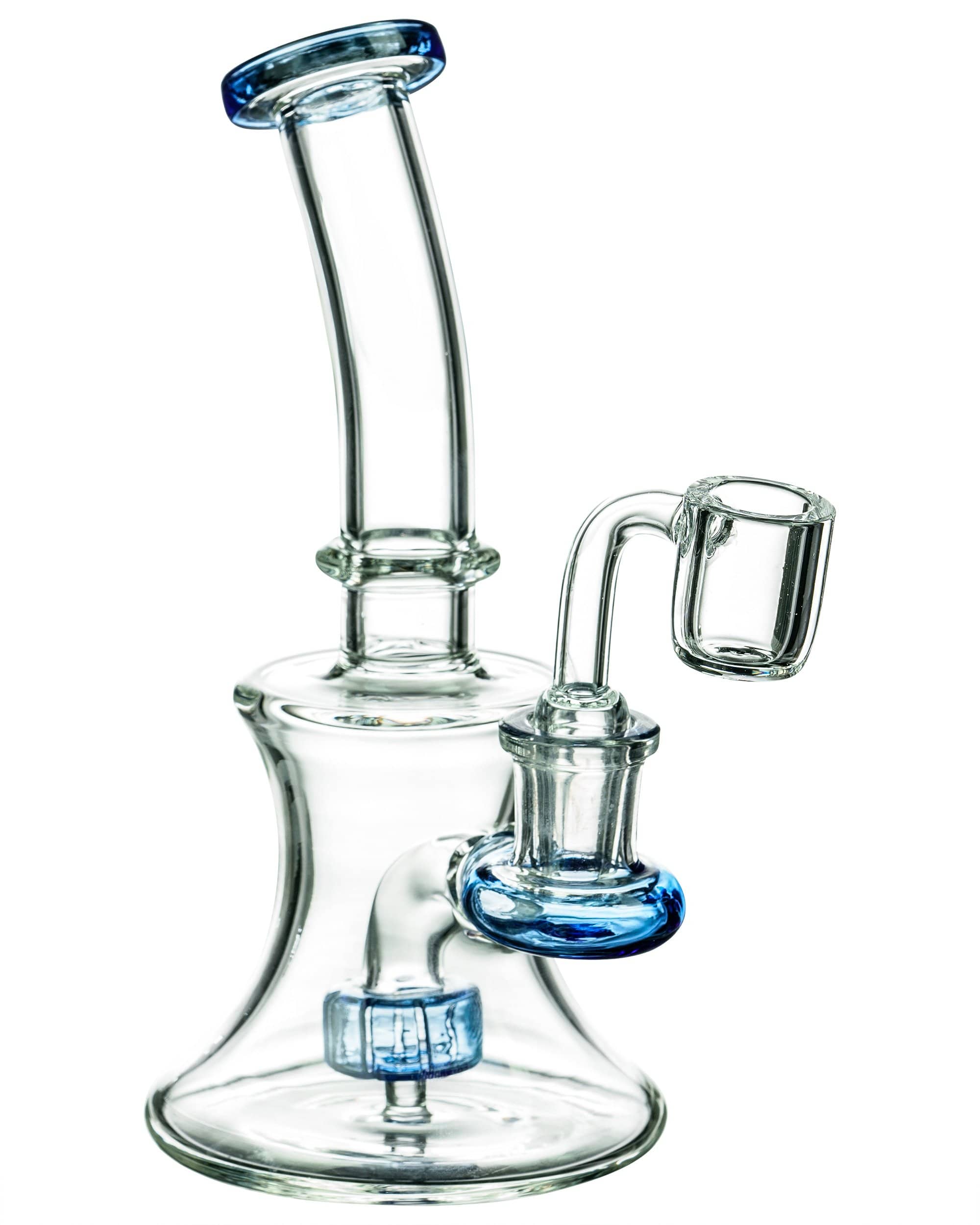 A close-up, angled view of the Hourglass Dab Rig With Colored Accents, showcasing its clear glass construction with subtle colored accents on the joint.