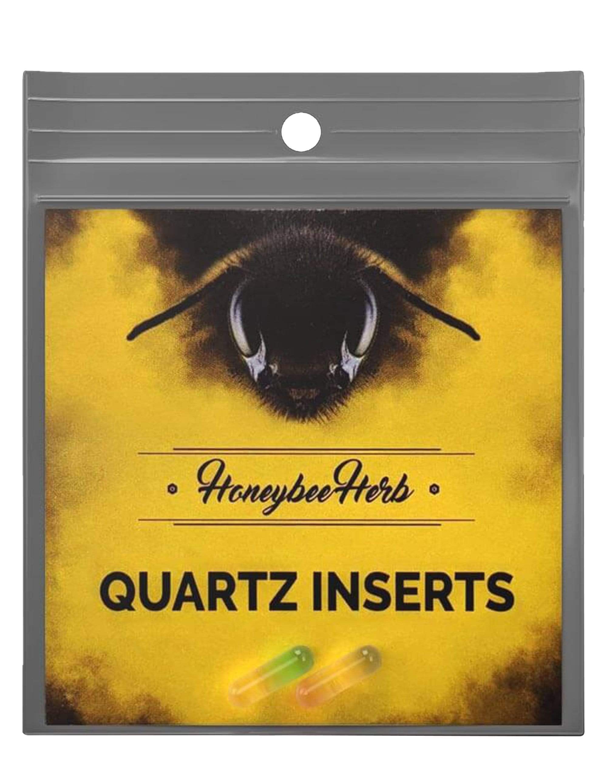 A close-up of Honey Capsules, with a translucent, pill-like form against a blurred, amber-toned background.