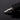 A close-up, angled view of the STINGER 2 Electric Nectar Collector, showcasing its sleek, metallic design against a dark background.