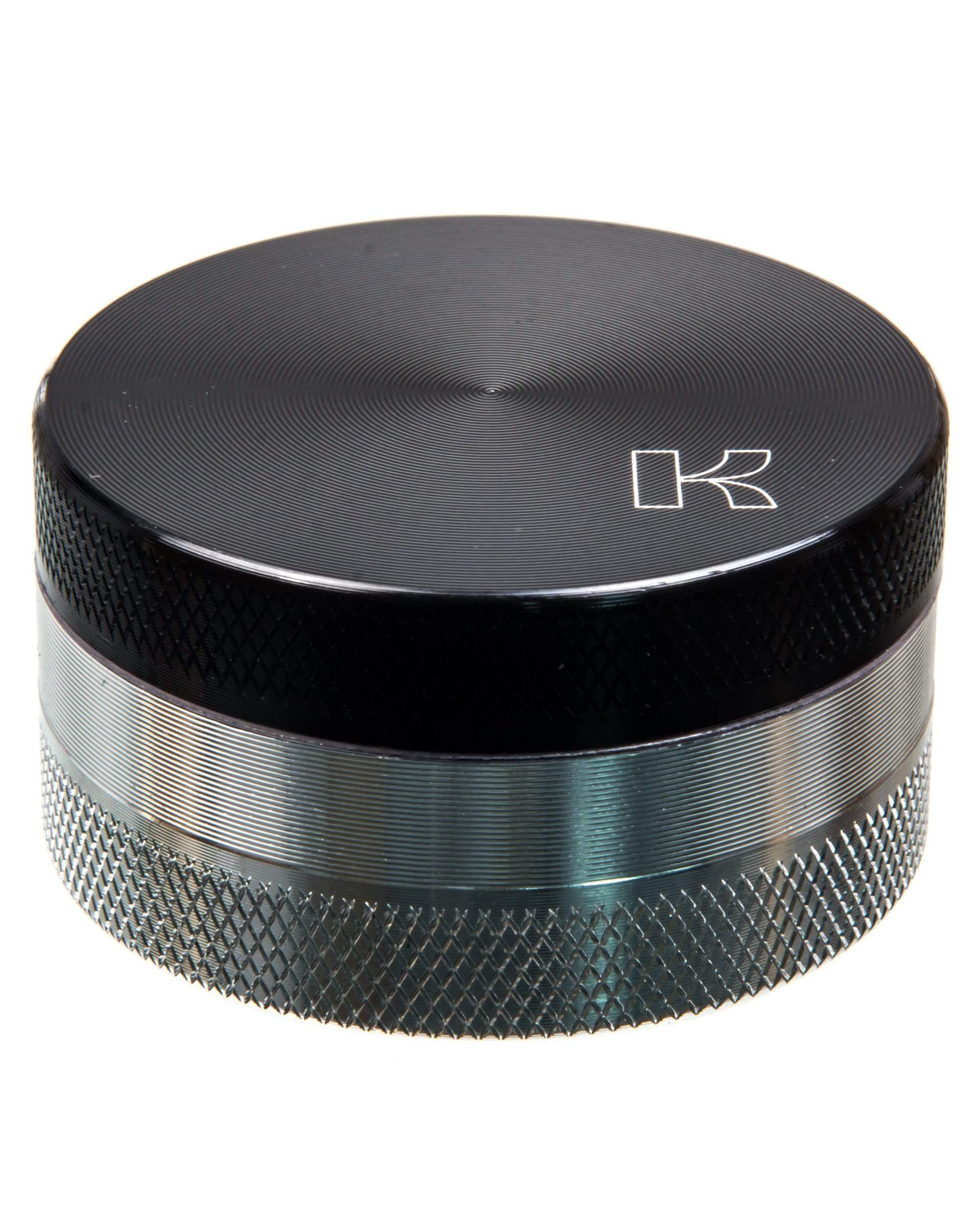 kannastor single chamber herb grinder, black and silver colored