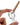 Close-up of a hand holding the clear glass MJ Arsenal Martian Blunt Bubbler at an angle, white background and a visible brown blunt inserted.