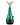 Front view of the “Mermaid” Ocean Goddess Bong, a sculpted glass piece with a blue-green hue and a delicate, flowing form.